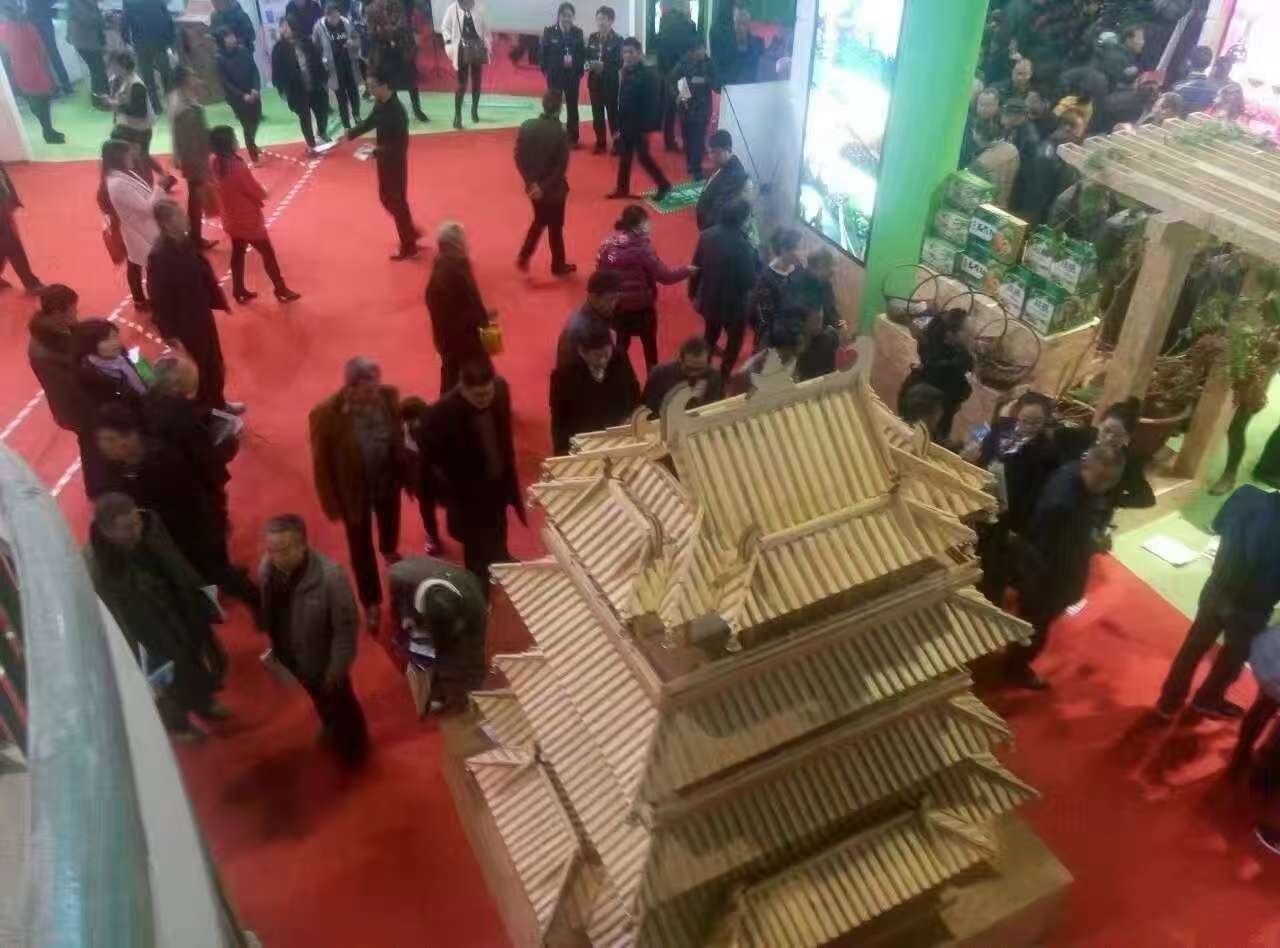 Exhibition view of the large wooden Guanque Tower model